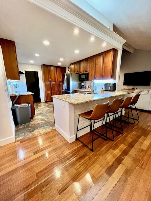 Fridge, microwave, oven, stovetop - Centennial Charm: 4BR, 2.5BA w/ Grand Primary Ensuite (Centennial)