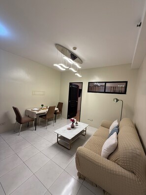 Standard Condo | Living area - Carnivale Inn Staycations (Manila)