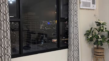 Family Condo, City View | Desk, laptop workspace, free WiFi