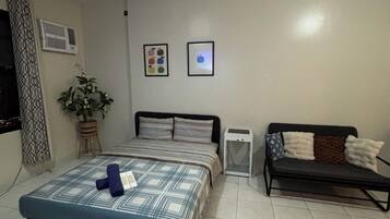 Apartamento familiar, vistas a la ciudad | Escritorio, espacio para trabajar con un portátil, wifi gratis