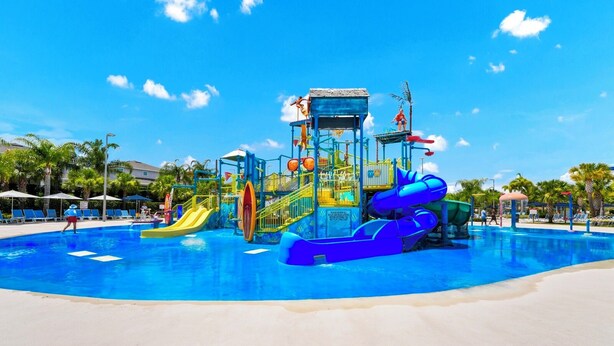 A water park with slides and a pool. - Reunion Village Home near Disney: Private Pool & Waterpark - 7880ML (Kissimmee)