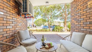 Terrace/patio - Gretel Lodge 3, 1 Gretel Cl - Between Beaches with air con, linen and Wi-Fi (Nelson Bay)