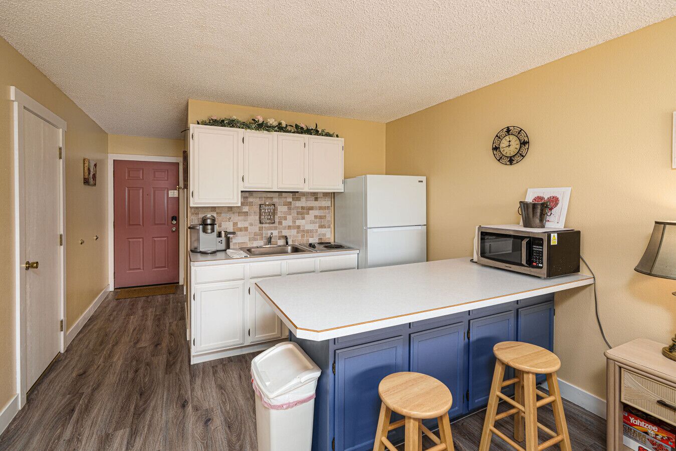Fridge, microwave, stovetop, coffee/tea maker