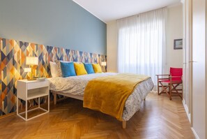 2 habitaciones y tabla de planchar con plancha 
