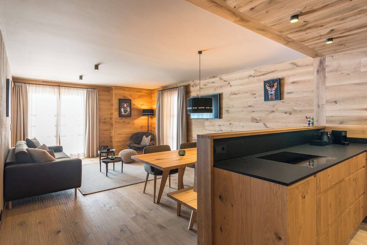 Apartment, Balcony, Mountain View | Living area | Flat-screen TV