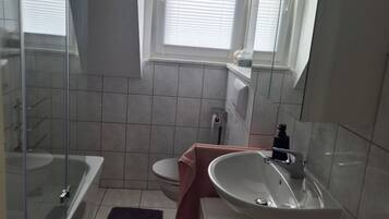 Hair dryer, towels, soap, toilet paper