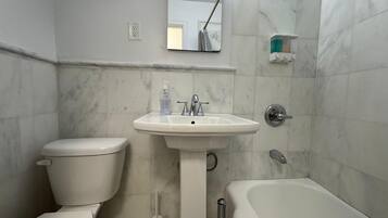 Hair dryer, towels, soap, toilet paper