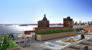 Outdoor dining - Rector Place 1BR Retreat with Fitness Room & Pool (New York)