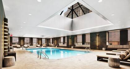 Stylish 1BR Condo w/ Fitness Room & BBQ Area – Rector Place