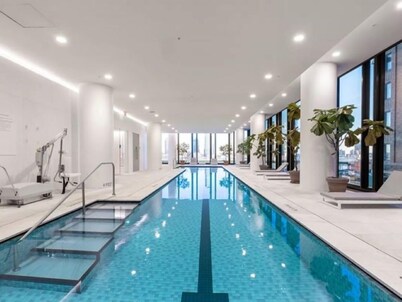Bright 1BR City Retreat w/ Pool & Gym