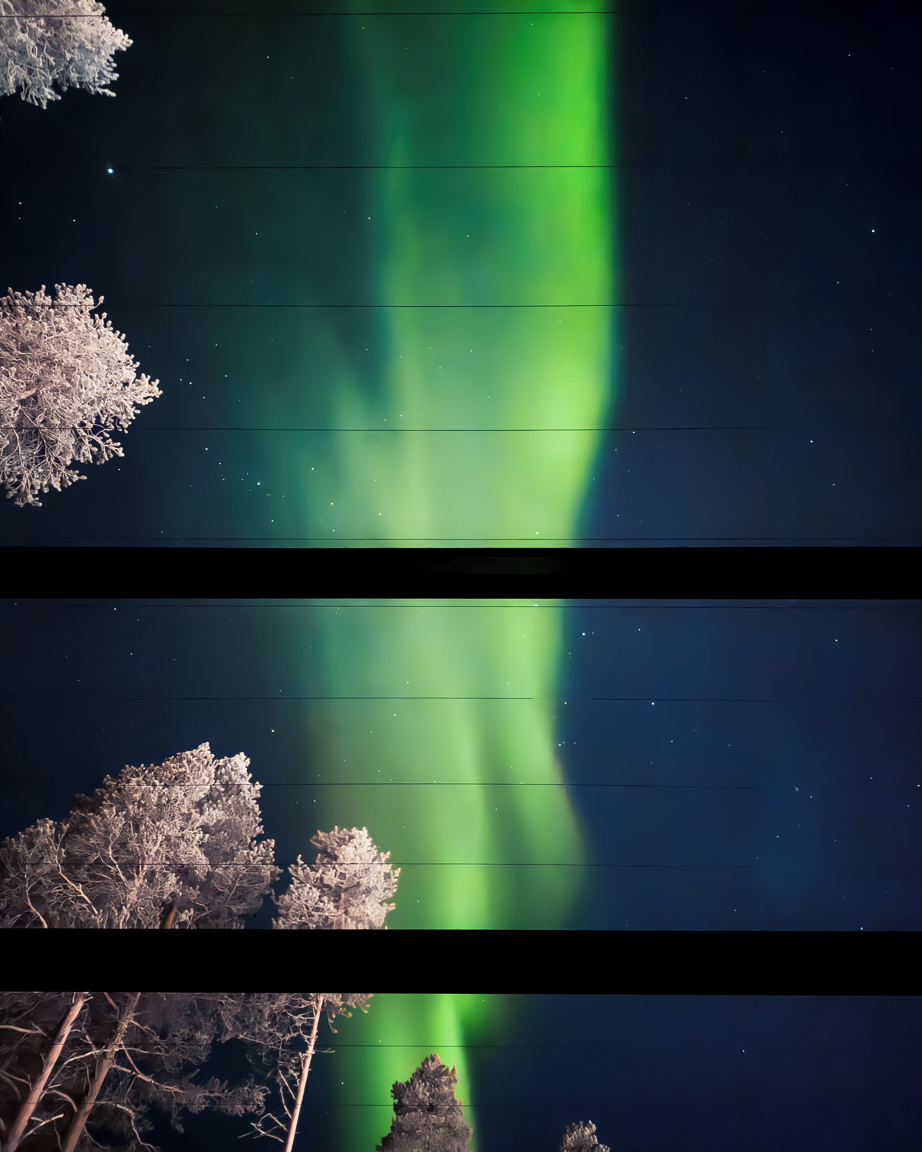 A night sky with the aurora borealis.
