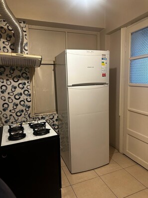 Appartement Deluxe, balcon, vue ville | Cuisine partagée