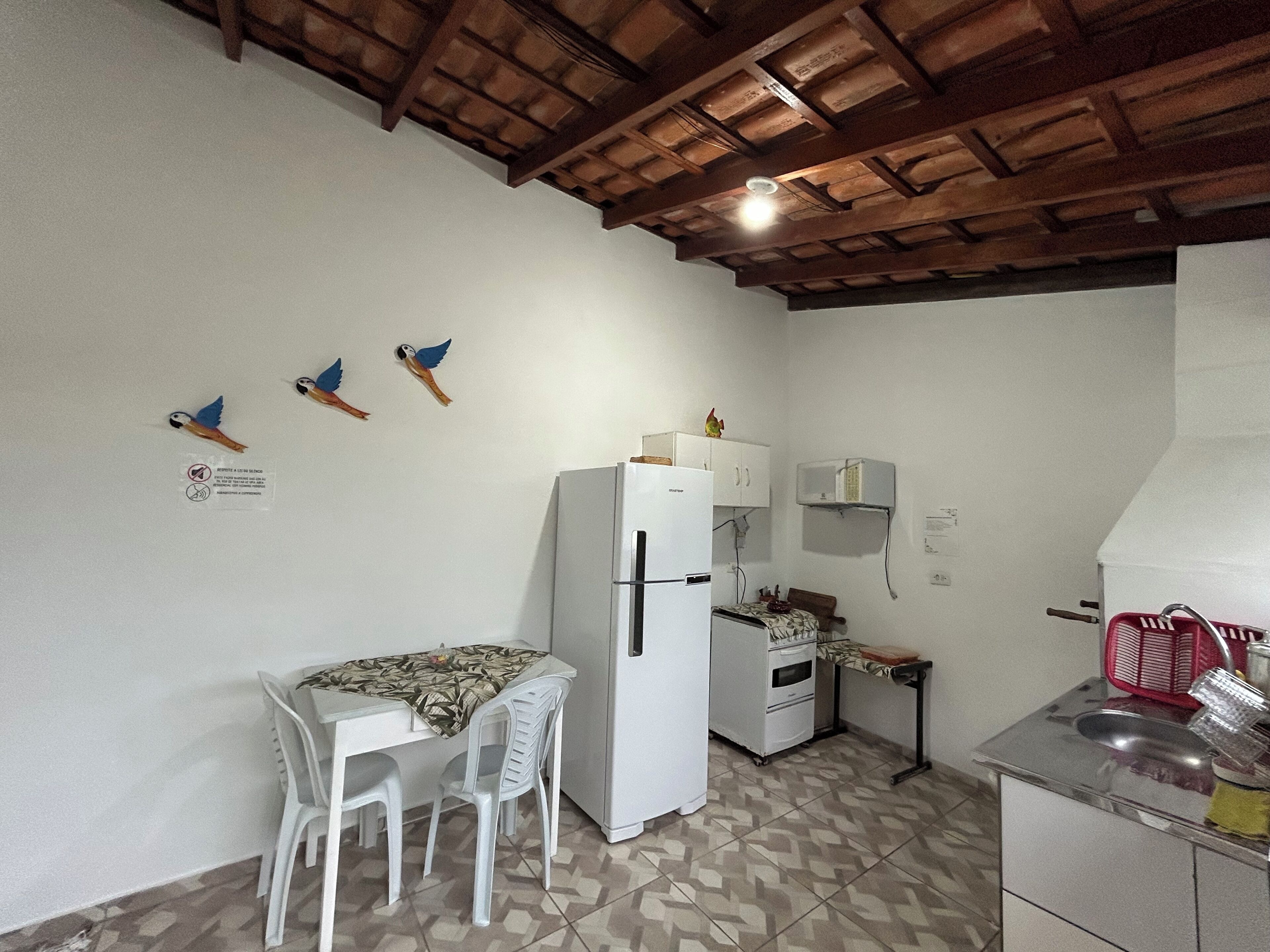 Fridge, microwave, stovetop, cookware/dishes/utensils