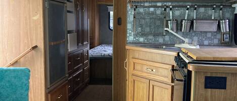 Fer et planche à repasser, draps fournis