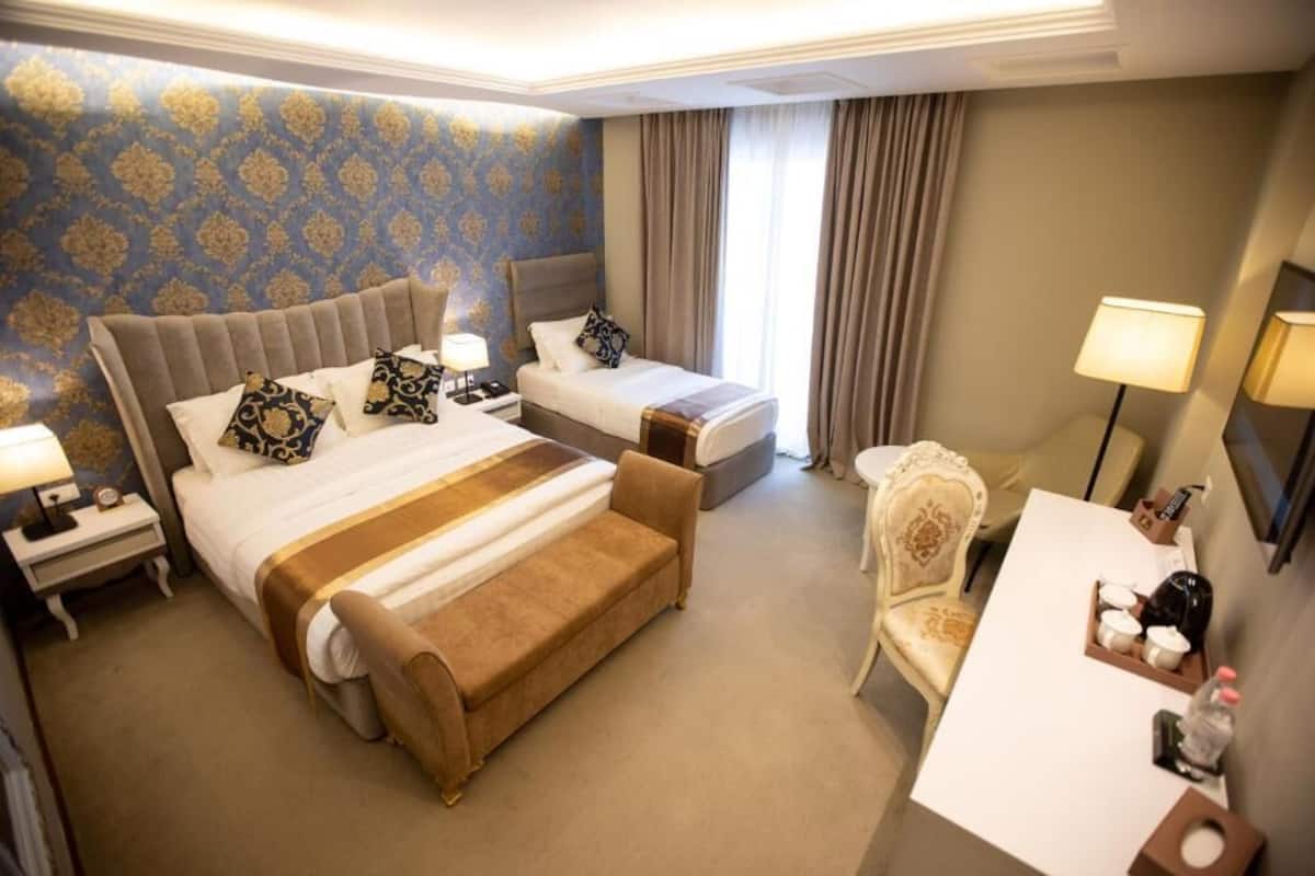 Habitación triple, balcón, vista a la alberca | Wifi gratis