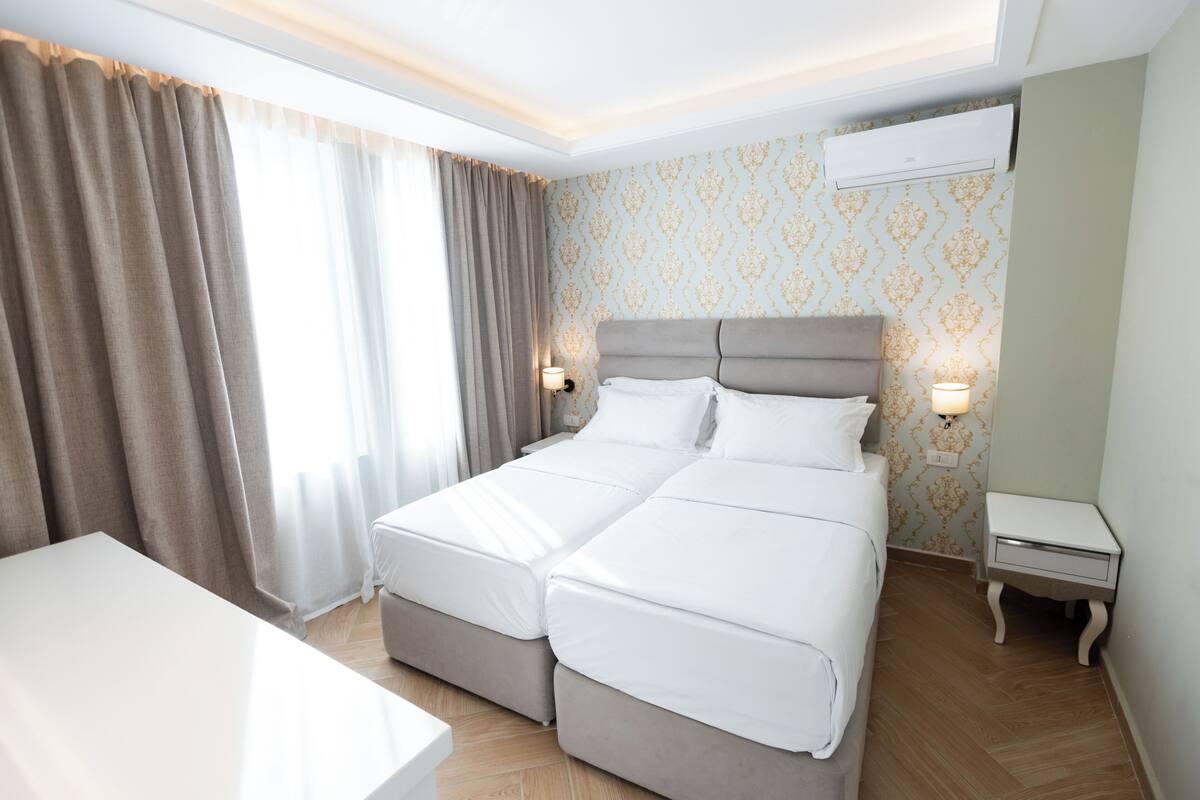 Double Room, Balcony, Pool View | Desk, WiFi (free), bed sheets