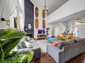 Living area - Theater Pool Sandbox Firepit Lau Escape Lux Living Room (Grand Prairie)