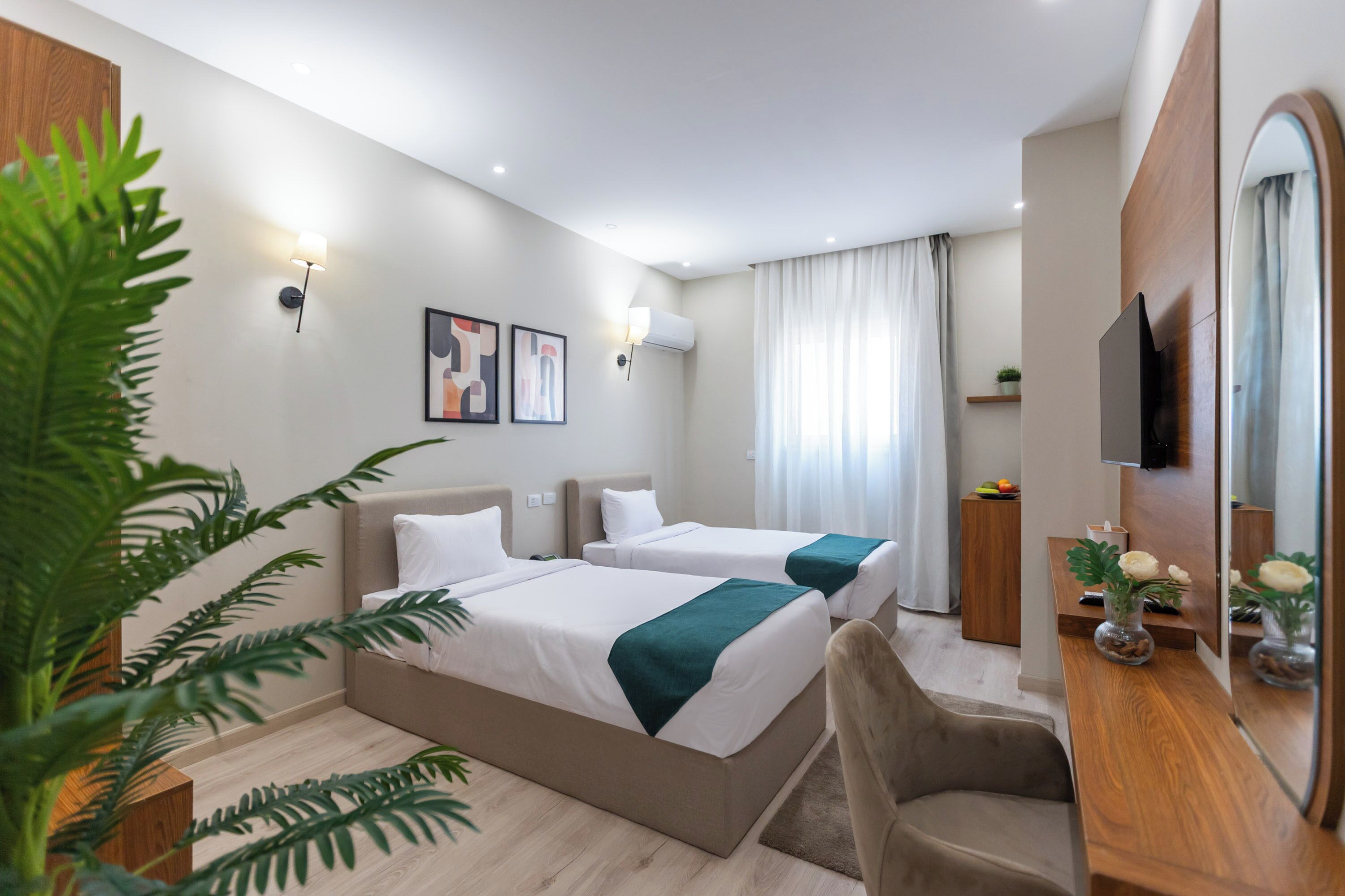 Superior Twin Room | Minibar, in-room safe, desk, blackout drapes