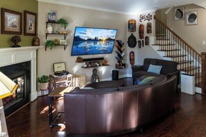 Smart TV, fireplace, books