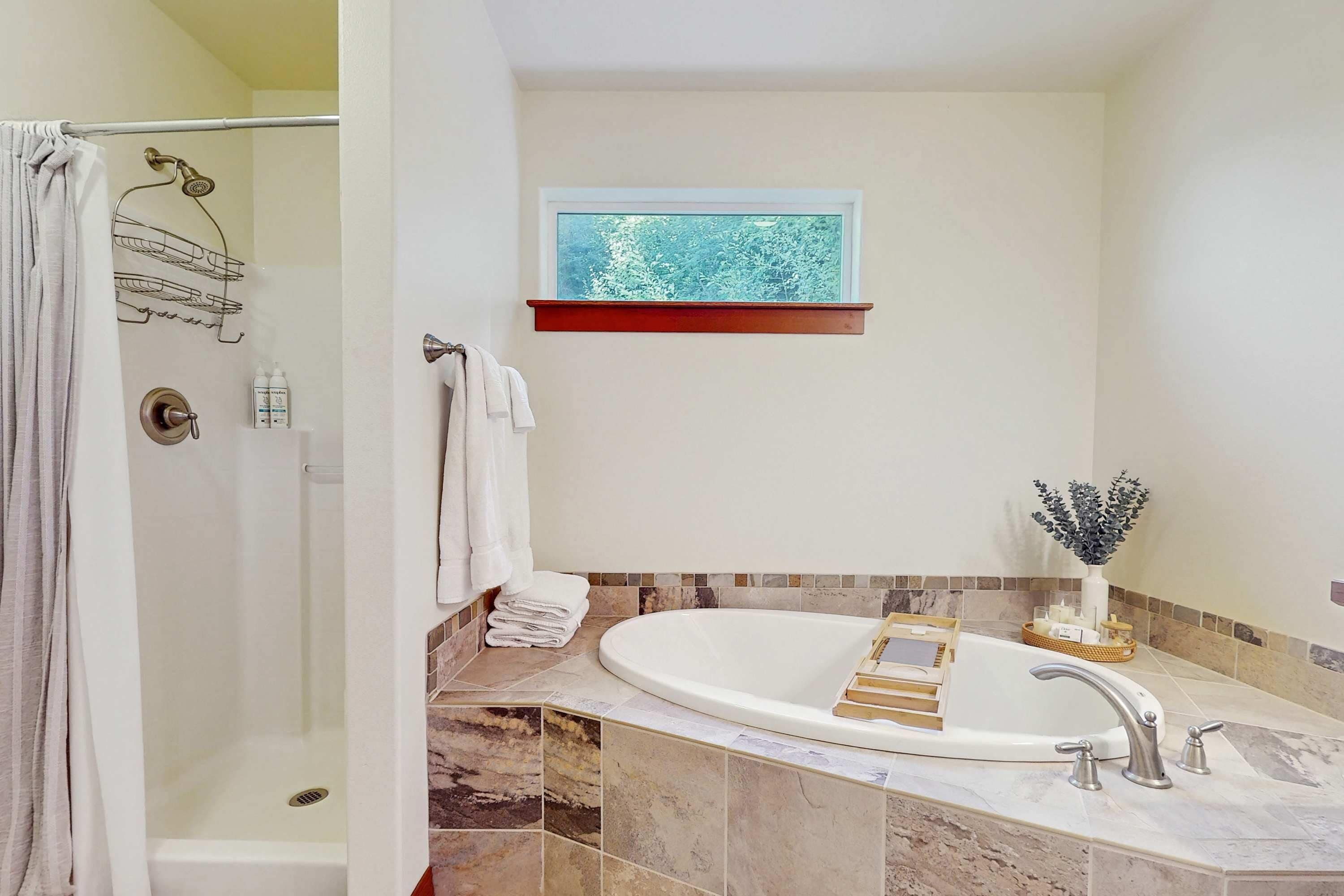 Shower, hair dryer, towels, shampoo