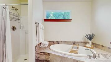 Shower, hair dryer, towels, shampoo