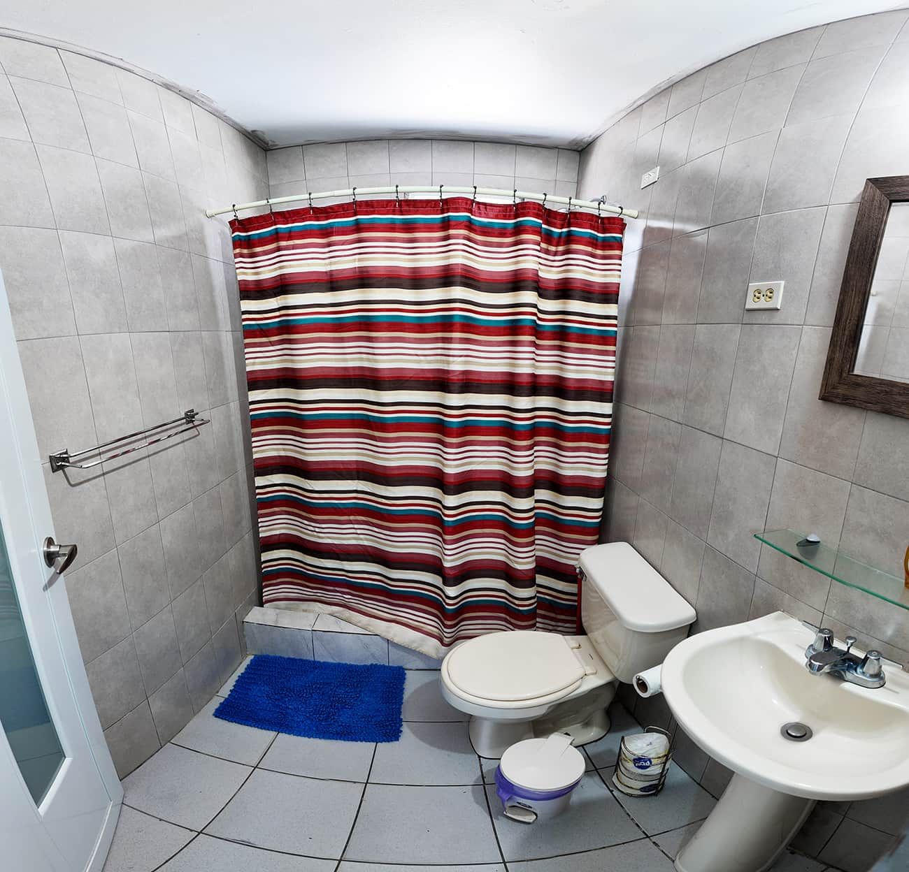 Full Bathroom with shower gel soap and shampoo/conditioner