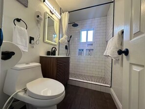 Shower, hair dryer, towels, soap