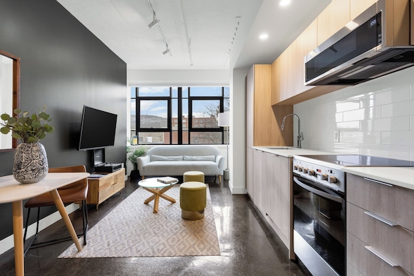 Exclusive Loft | Desk, laptop workspace, blackout drapes, soundproofing