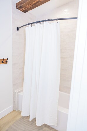 Hair dryer, towels, soap, shampoo