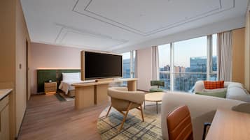 Premium Room, 1 King Bed | Living area | TV