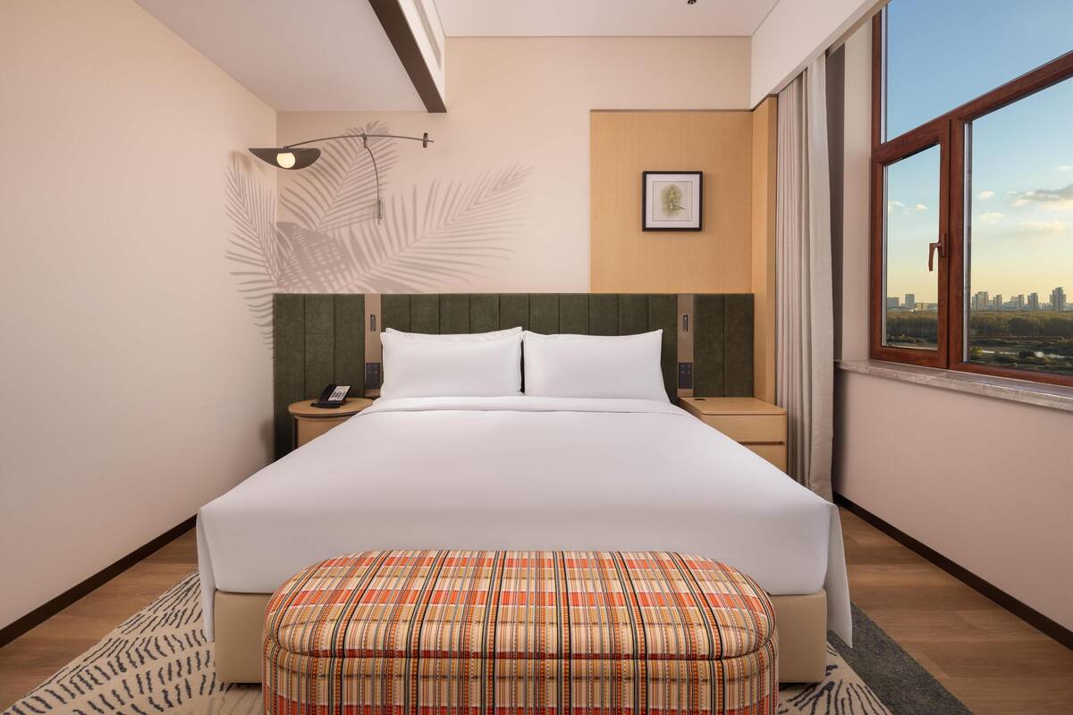 Premium bedding, down comforters, memory foam beds, minibar