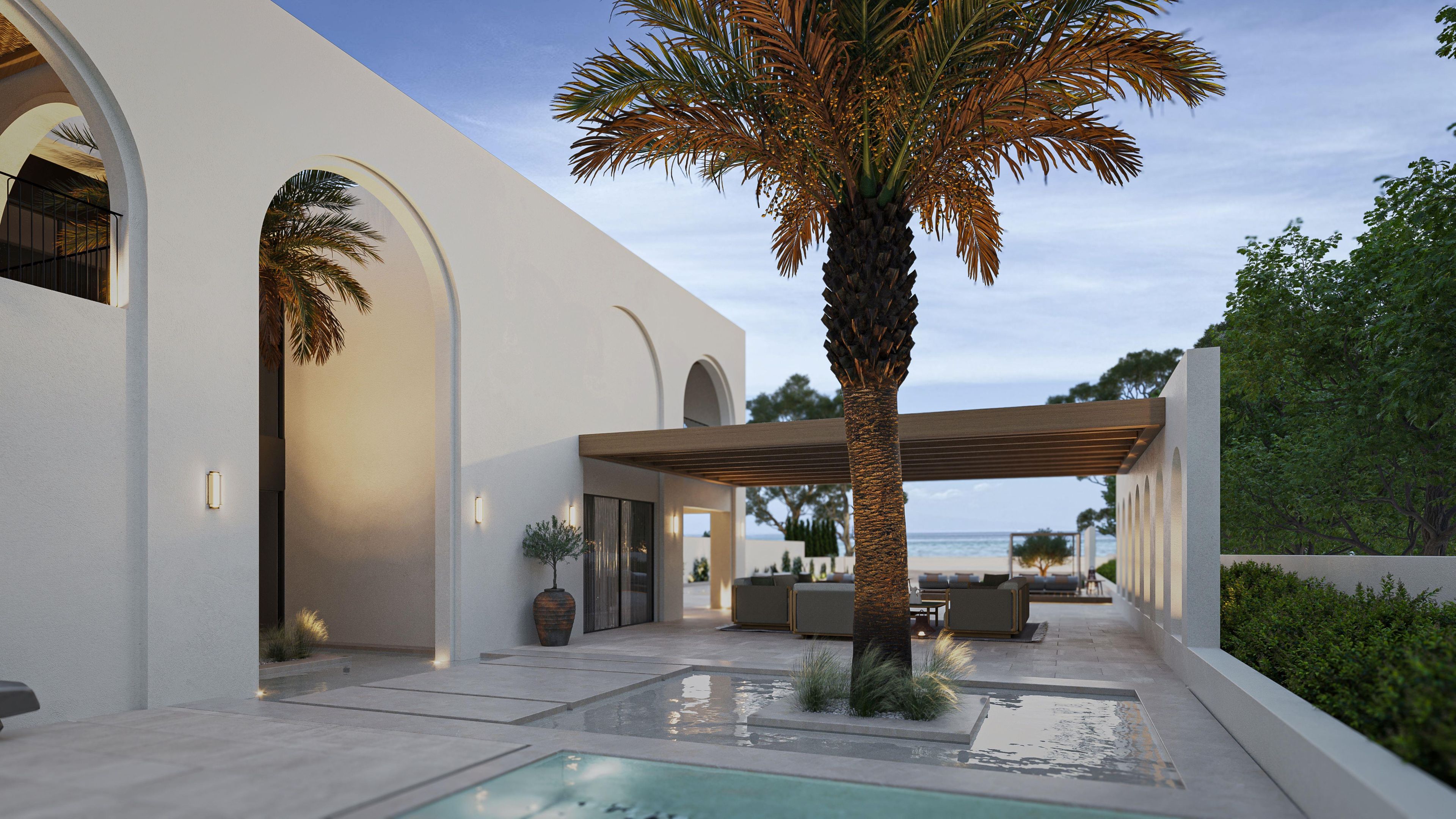 A modern outdoor patio with a pool, seating area, and a view of the sea.