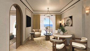 Un salon moderne avec une table ronde, deux chaises, un canapé et une vue sur la mer.