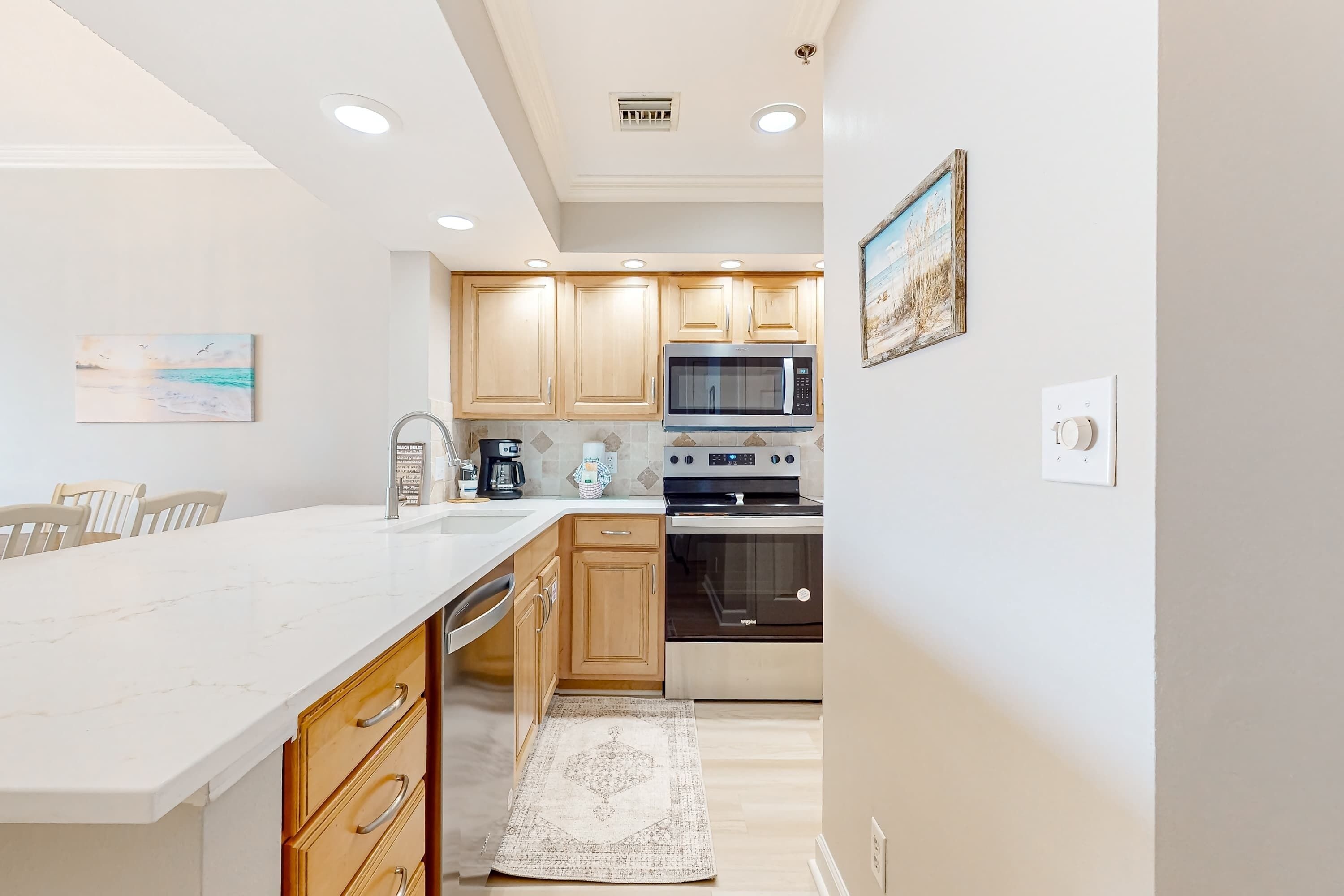 Fridge, oven, dishwasher, dining tables