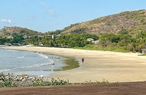 On the beach, sun-loungers, beach towels - Exclusive Manzanillo Bay Residencias 1-bdrm, seaside condo in charming Troncones (Troncones)
