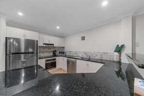 Fridge, oven, stovetop, dishwasher - Modern Retreat by the Beach (North Ward)