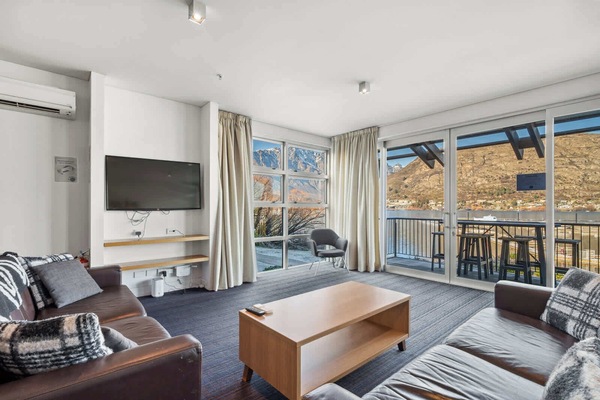 Lounge in comfort with plush seating and flat-screen entertainment.