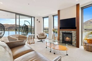 TV, fireplace, offices - Sunlit Serenity, Lakefront Apartment (Kawarau Falls)