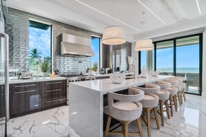 Fridge, microwave, oven, stovetop - Luxury Gulf-Front Sanctuary | Private Pool, Spa & Walk to Downtown (Fort Myers Beach)