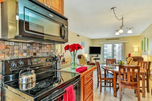 Fridge, microwave, oven, stovetop - Cozy Oceanfront Condo w/ Balcony, Pool & Steps to the Sand (New Smyrna Beach)