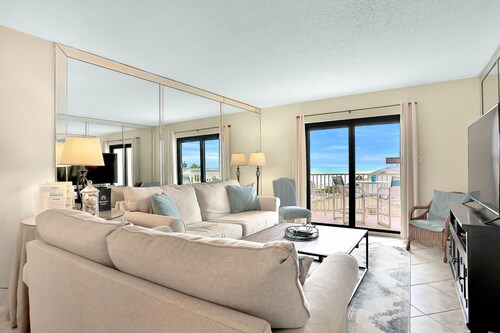 Oceanfront Relaxation with Balcony, Pool & Steps to Dining