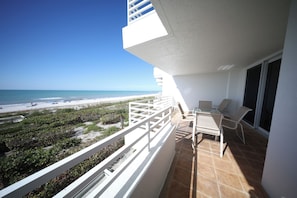Outdoor dining - Gorgeous Somerset Gulf Front Condo, Newly Remodeled, Sweeping Beach Views, Sunsets & Amenities! (Marco Island)