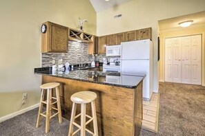 Fridge, microwave, oven, stovetop - Resort Escape • Heated Pool + Balcony • Sleeps 4 (Little River)