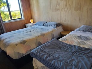 Iron/ironing board, travel crib, free WiFi, bed sheets