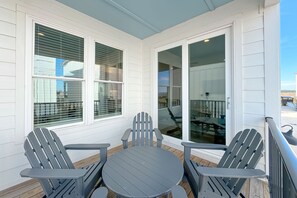 Terrace/patio - Coastal Chic Retreat | Steps to Beach, Pool Access & Gulf-View Balcony | BEACHBALL PROPERTIES (Gulf Shores)