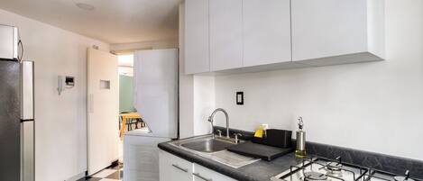 Fridge, microwave, stovetop, cookware/dishes/utensils