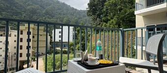 hotel abline the oaks private room with balcony mountain view in rishikesh