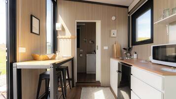 Fridge, microwave, stovetop, coffee/tea maker