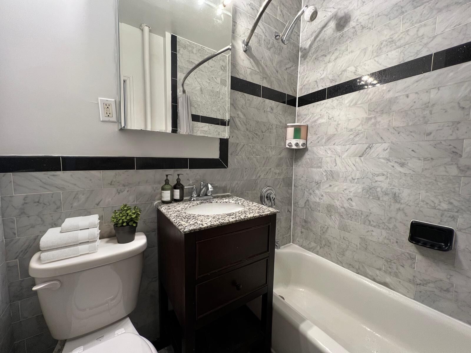 Hair dryer, towels, soap, toilet paper