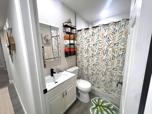 Shower, hair dryer, towels, soap